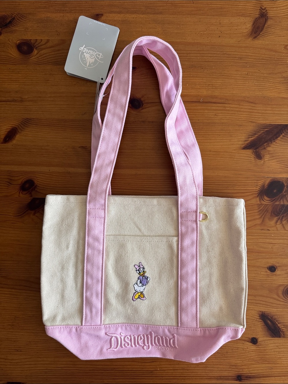 Disney Disneyland Resort Daisy Duck Canvas Tote in Pink and Cream
